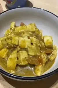 Moringa Halloumi Masala curry in a bowl